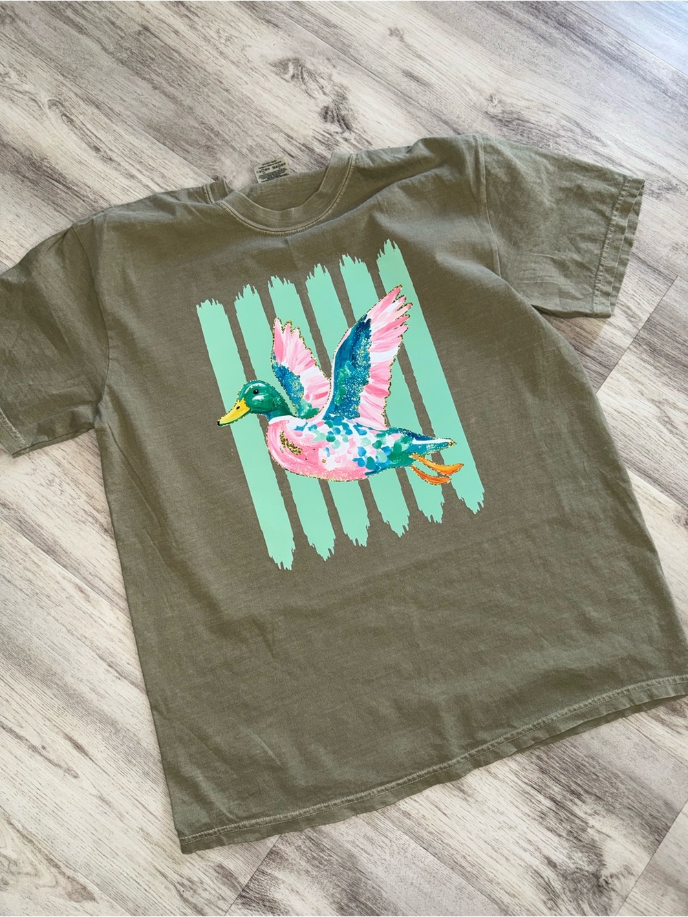 Comfort Colors Olive Tee with Colorful Flying Duck Graphic size large